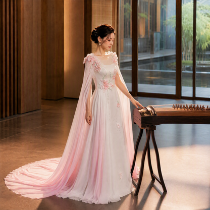 Ethereal Ivory and Pink Floral Appliqué Gown with Flowing Cape Sleeves